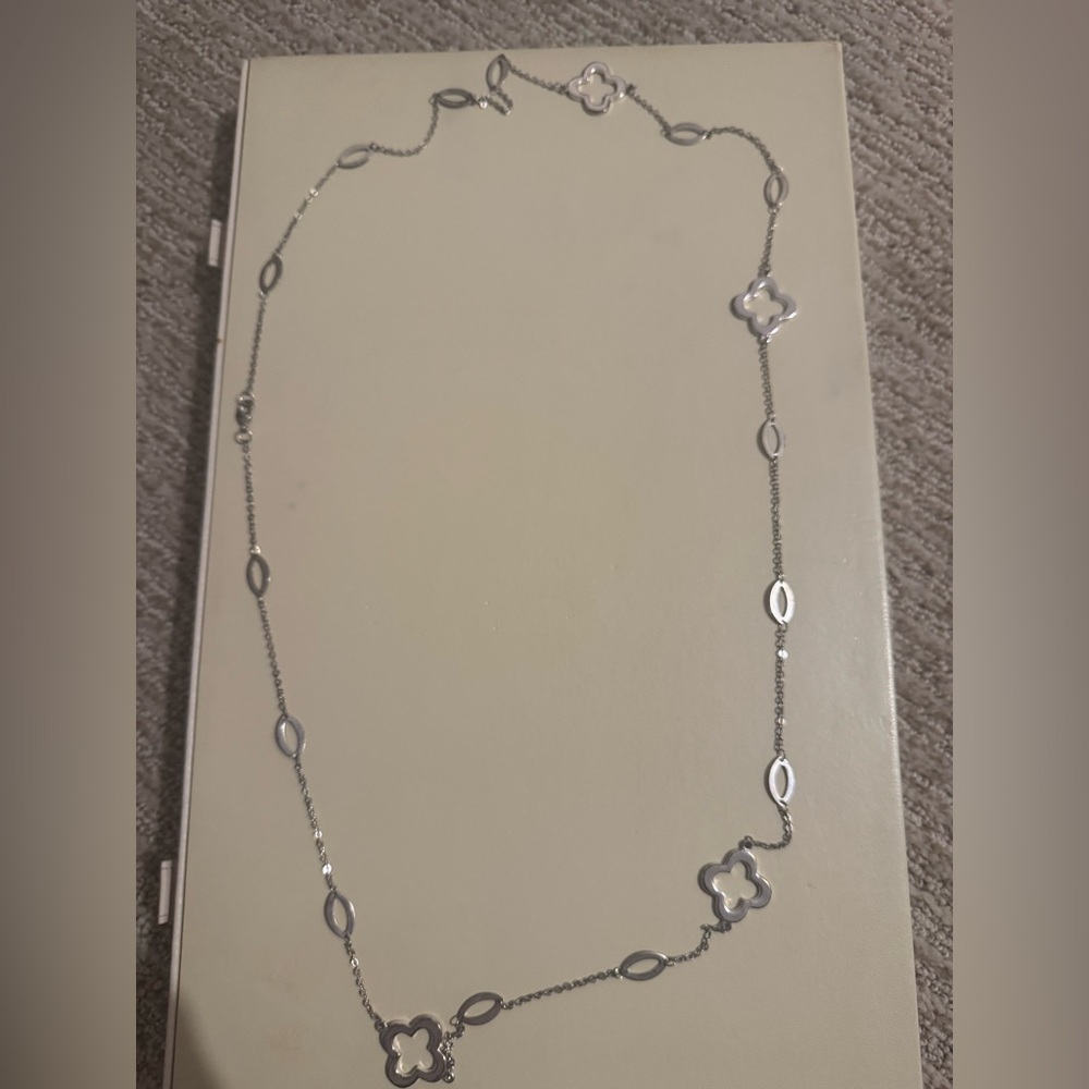 Elegant Silver Necklace with Floral Accents